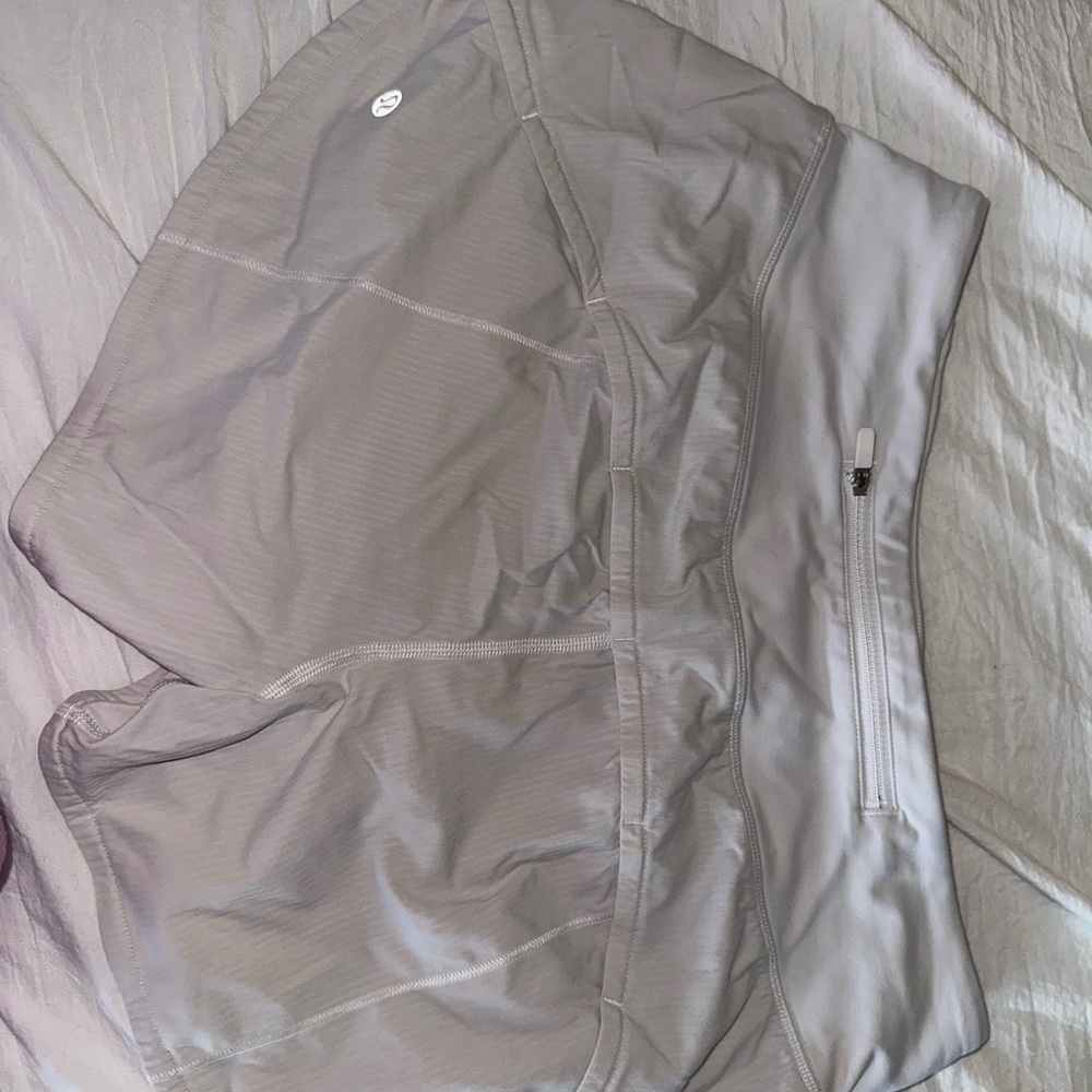 White Lululemon Shorts with Zipper Pocket. High rise. 4in